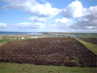 One acre of ploughed, harrowed and de-stoned field