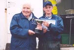 Local cattle stalwart Marion MacLeod presents the Royal Bank of Scotland Trophy for Supreme Cattle Champion to Calum A Mitchell, Brue Fold